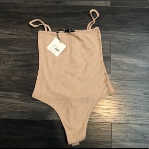 Nude strappy bodysuit